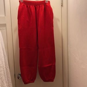 Woman’s red sweatpants